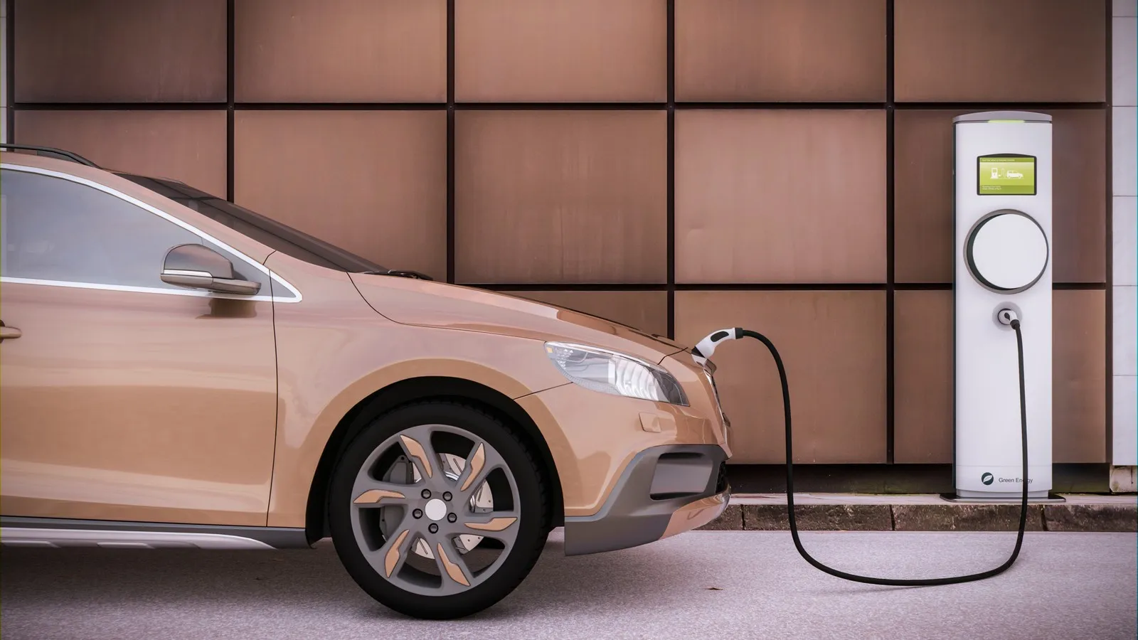 Pfirsich-farbenes E-Auto wird an einer Wallbox geladen.